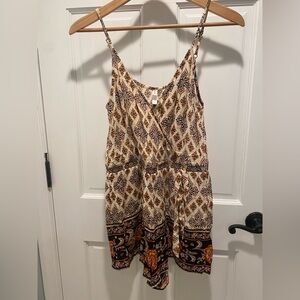 Sleeveless romper, size XS